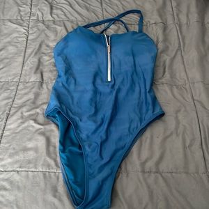 Blue swimsuit.  Worn once